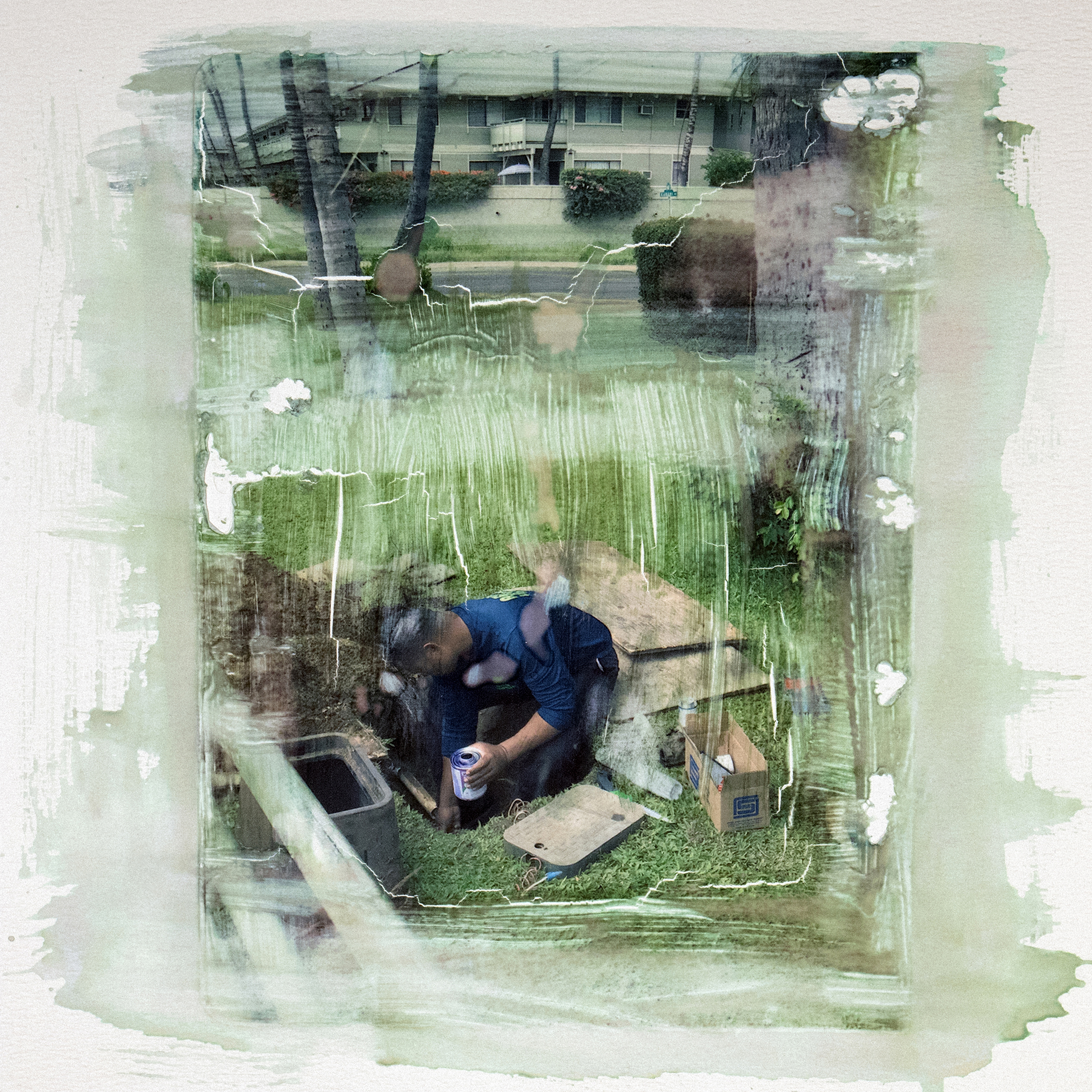 A Hawaiian day laborer works inside a hole in Kihei, Maui.